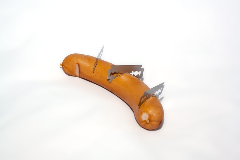 no people, cruelty to animals, weapon, wood - material, Razor Blades, cold temperature, fruit, dog bait, white background, simplicity, dog hater, Sausage