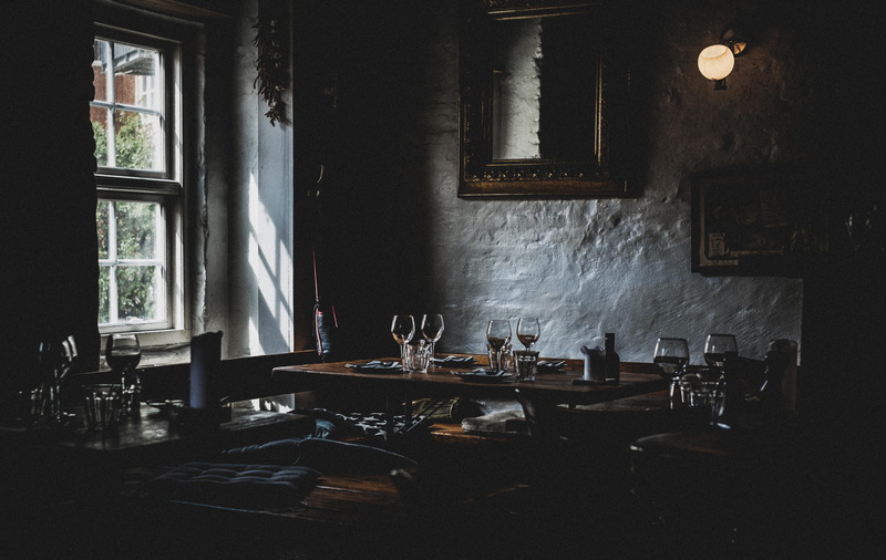 lighting equipment, architecture, window, absence, light, home interior, furniture, drink, chair, frame, table, glass, restaurant, domestic room, home