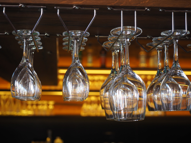 container, indoors, shelf, setup, glasses, in a row, arrangement, business, side by side, still life, glasses holder, upside down, bar - drink establishment