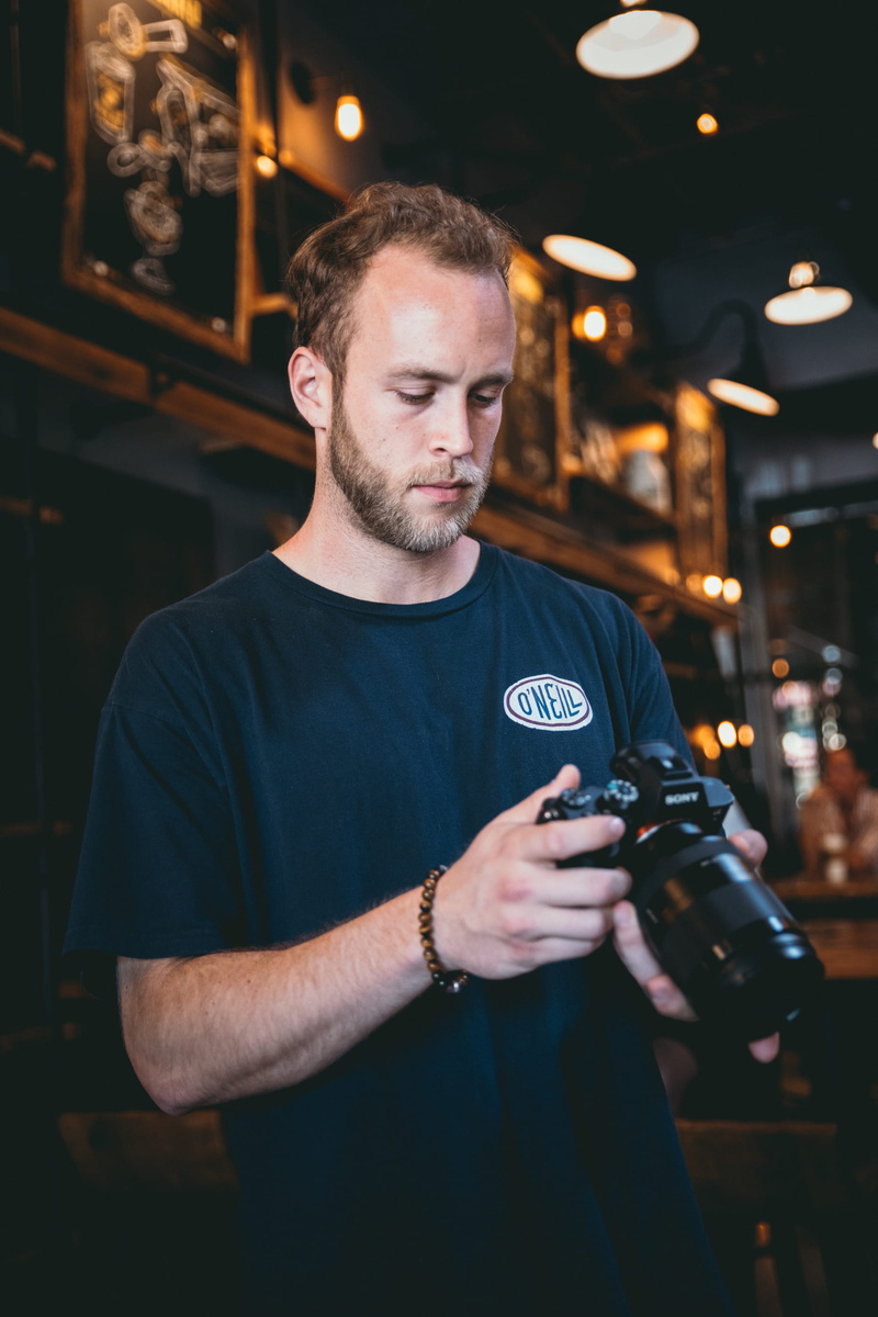 casual clothing, pose, interior design, young adult, looking, 2K, camera rig, dslr, alcohol, food and drink, refreshment, shooting, shot, model, shooter