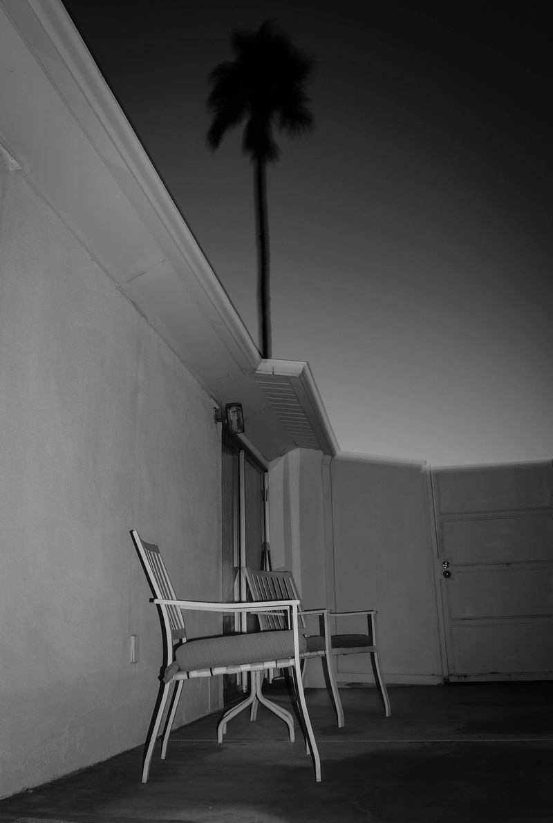 outdoors, house, clear sky, seats, patio, palm springs, tropical climate, black and white, lonely, built structure, wall - building feature, building, foldable