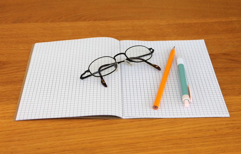 wooden surface, note, education, wood grain, learning, eyeglasses, notebook, table, directly above, furniture, wood, blank, page, close up, eyewear, glasses