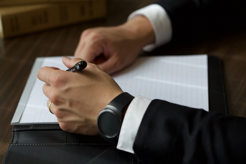 wireless technology, ballpen, businessman, jacket, communication, corporate attire, one person, human hand, suit, paper, technology, watch, indoors, close-up
