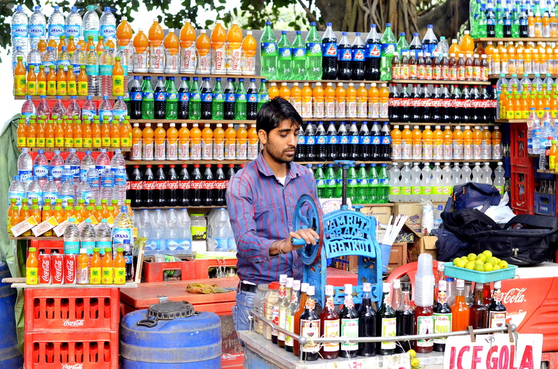choice, bazaar, vendor, container, retail, one person, man, drink, supermarket, liquor, front view, order, adult, beverage, consumerism, pantry, choosing