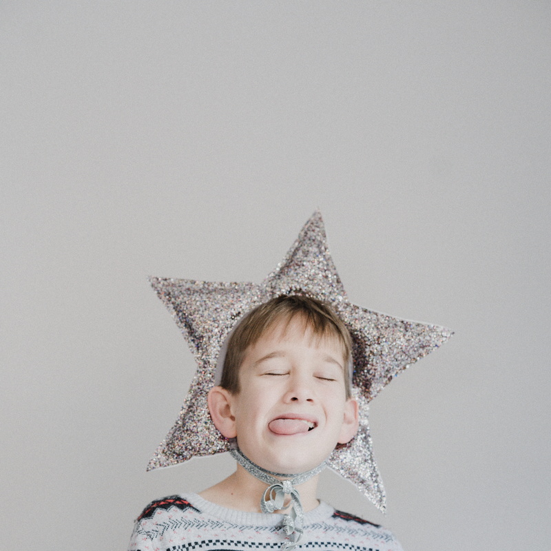 real people, person, clothing, sleeve, long sleeve, party hat, copy space, headshot, sun hat, child, boy, front view, childhood, dirt road, emotion, portrait