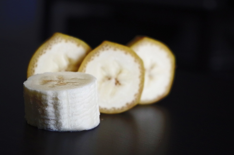 white color, focus on foreground, cross section, pieces, indoors, banana, food and drink, chinese food, 4K, still life, black background, fruit, studio shot
