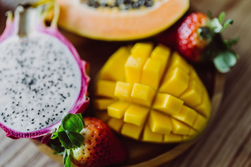 4K, healthy lifestyle, fruit salad, freshness, no people, choice, pineapple, papaya, slice, raw, sweet, cross section, indoors, fresh, healthy, table