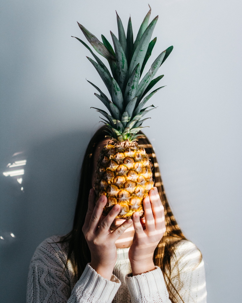 holding, portrait, front view, leisure activity, healthy eating, obscured face, unrecognizable person, indoors, real people, front, food, photo, 4K, pineapple