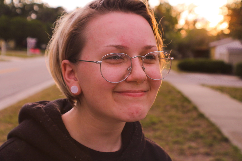 child, focus on foreground, eyeglasses, cute, joy, human face, females, enjoyment, looking at camera, emotion, beautiful, leisure activity, outdoors, adult