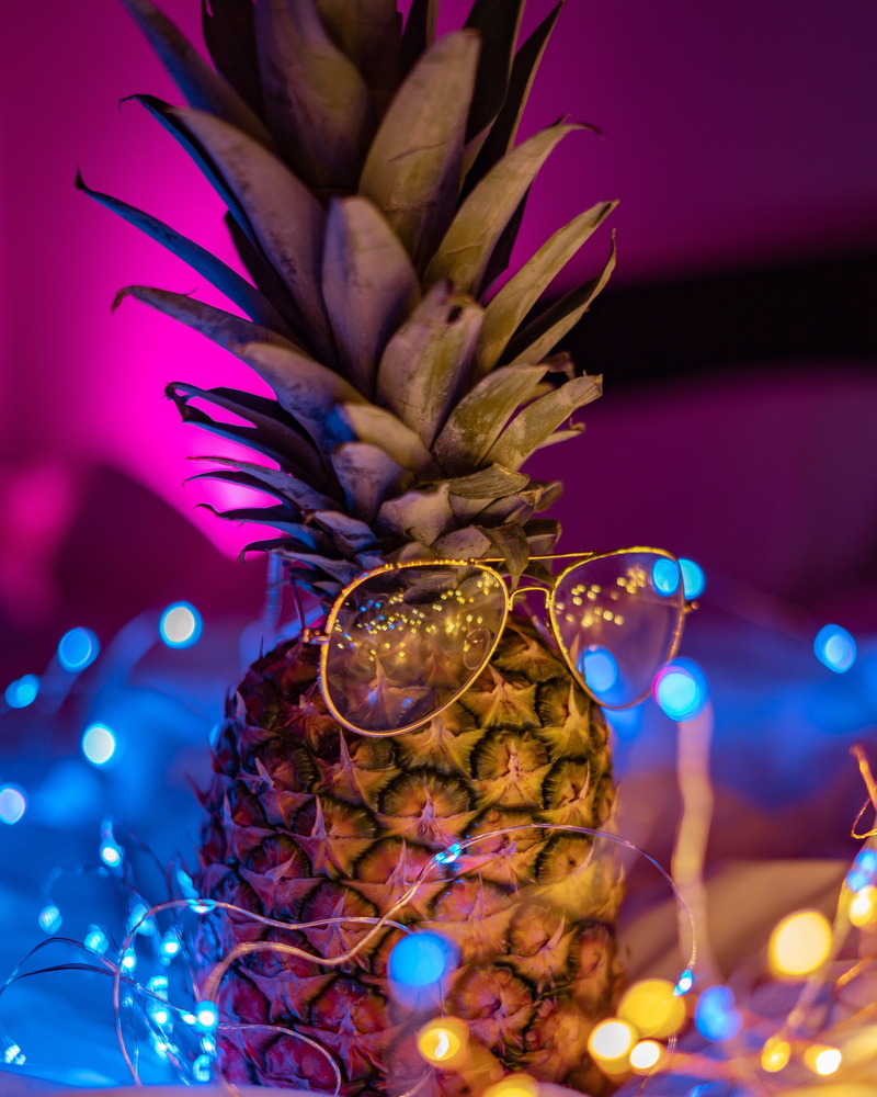 parody, london, pineapple, focus on foreground, bokeh, yellow, neon, no people, portrait, tropical fruit, glass, multi colored, scott webb photography