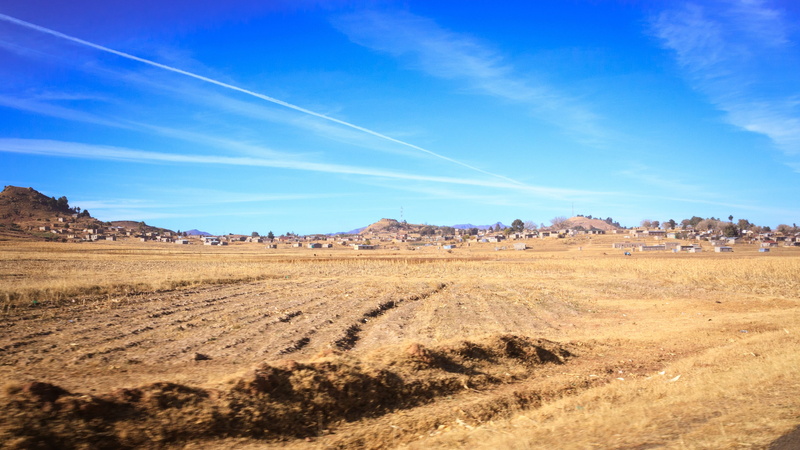 sky, tranquil scene, no people, cloud - sky, environment, rural scene, blue, agriculture, semi-arid, lesotho, nature, land, outdoors, deserted, tranquility