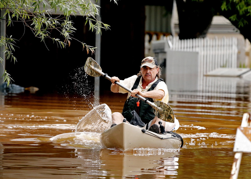 oar, one person, canoe, sitting, texas flooding, mature men, men, day, river, adult, lexington, real people, outdoors, holding, oklahoma, water, waterfront