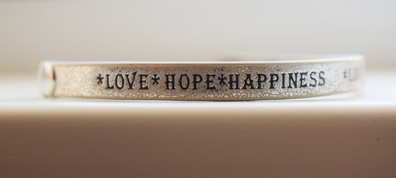 ornate, silver, close-up, studio shot, indoors, label, photo, the inscription, focus, western script, bracelet, elegance, hope, accessory, selective focus
