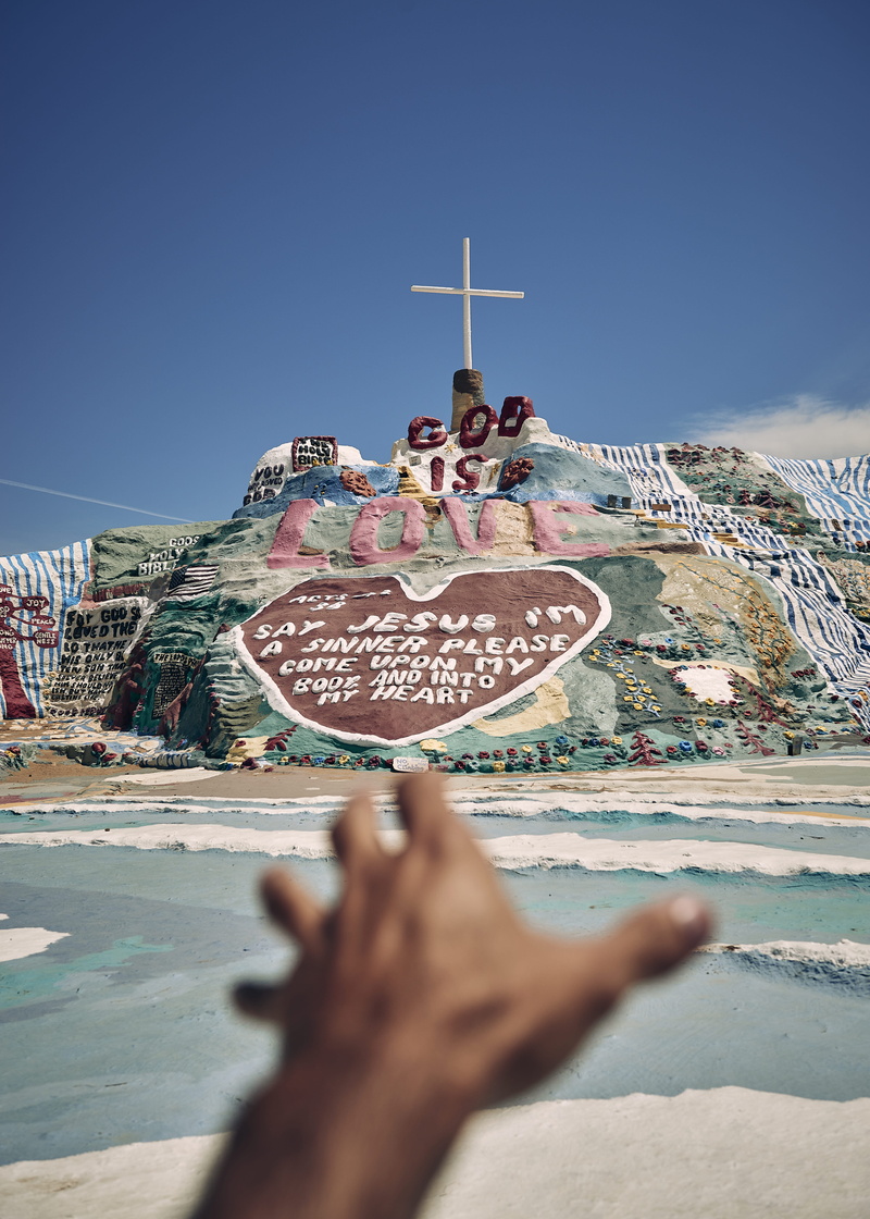 built structure, mountain, jesu, phoyography, reach, lifestyles, figurine, architecture, hand, human body part, day, love, religion, human hand, travel