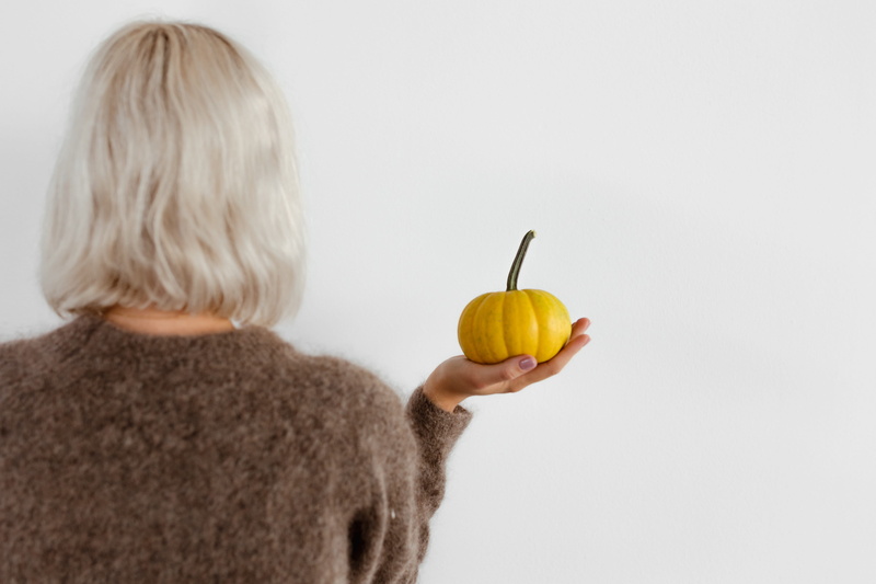 women, orange, halloween, blond hair, hand, wellbeing, hands, healthy eating, fall, freshness, one person, fruit, healthy lifestyle, yellow, childhood
