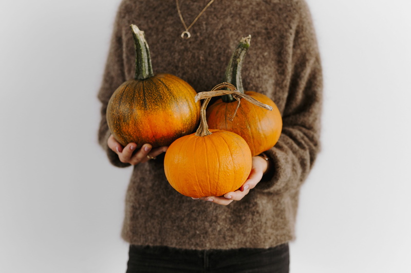 wellbeing, s, women, halloween, standing, 5K, food and drink, fruit, fall, sweater, orange, indoors, food, one person, yellow, front view, autumn, agriculture