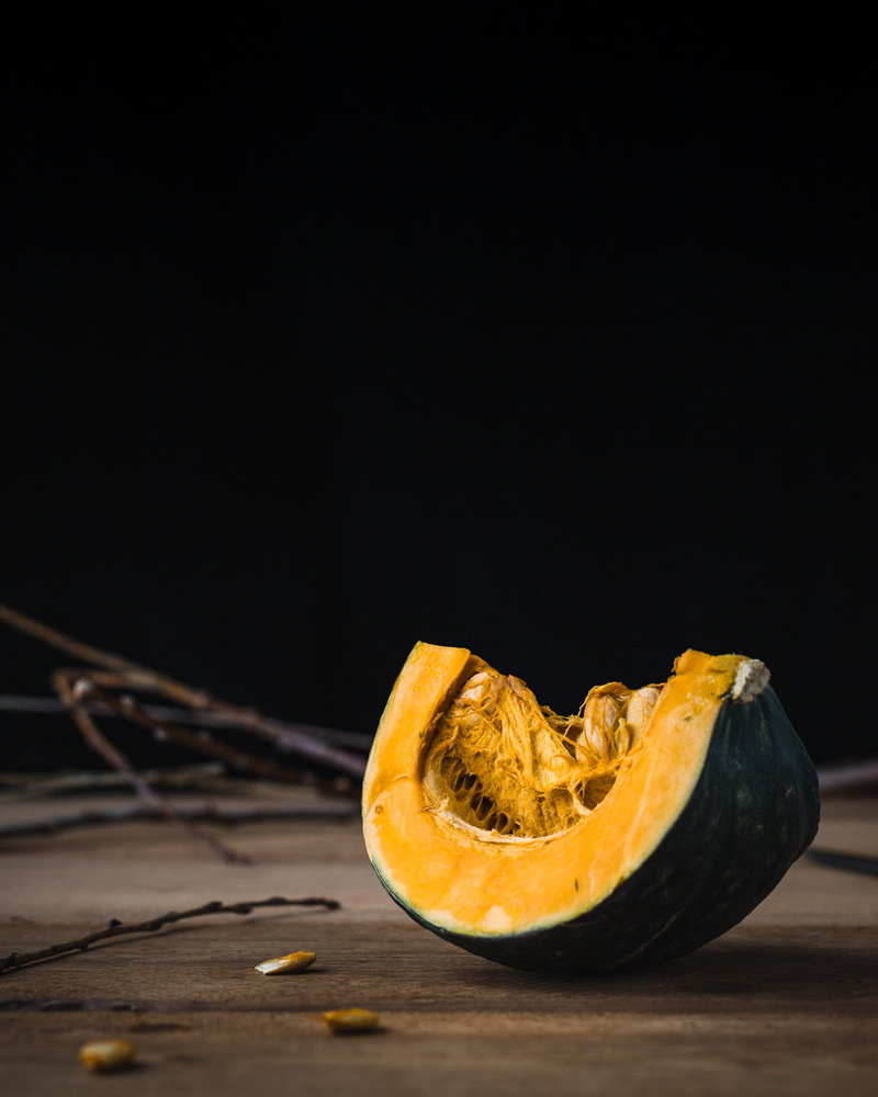 wood - material, still life, studio shot, cross section, copy space, black background, no people, orange color, freshness, wellbeing, squash, food, close-up