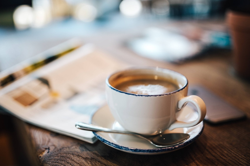 wood - material, short, table, hot drink, close-up, food, hotel, glass, eating utensil, kitchen utensil, puro hotel, interior, latte, coffee - drink, no people