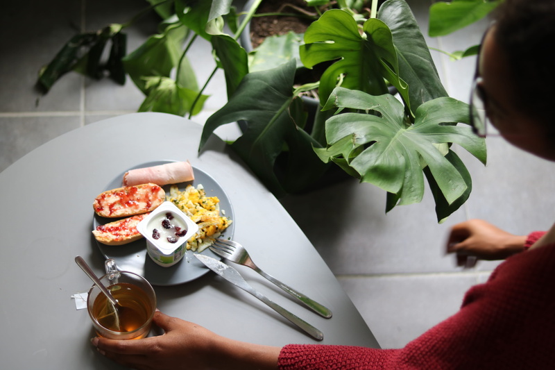 fork, outdoors, leaf, ready-to-eat, lifestyles, potted plant, meal, produce, blossom, yogurt, real people, vase, indoors, leisure activity, cutlery, drink