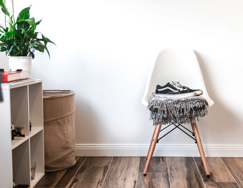 indoors, potted plant, nature, domestic room, no people, apartment, hardwood floor, plant, vans, eames, sneakers, wall - building feature, houseplant, white