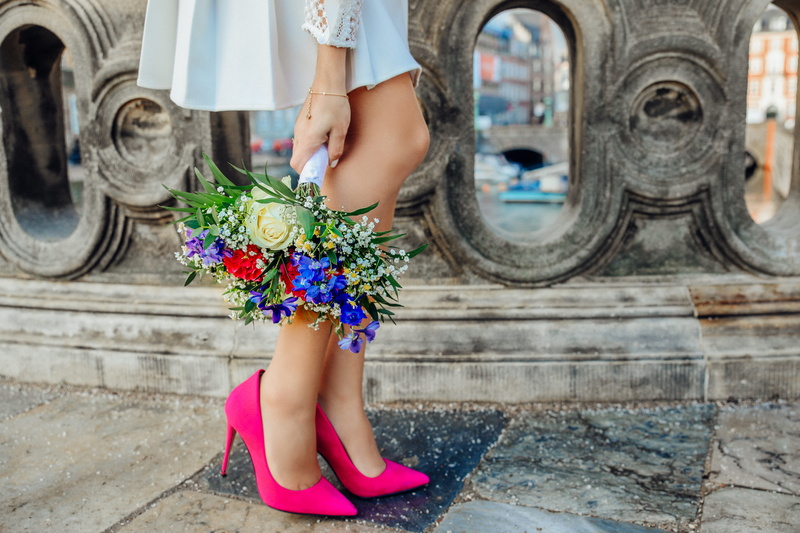 fence, beside, human body part, blue, red, innocence, petaled, flowers, fashion, lifestyles, concrete, human leg, dress, 5K, white, childhood, bouquet
