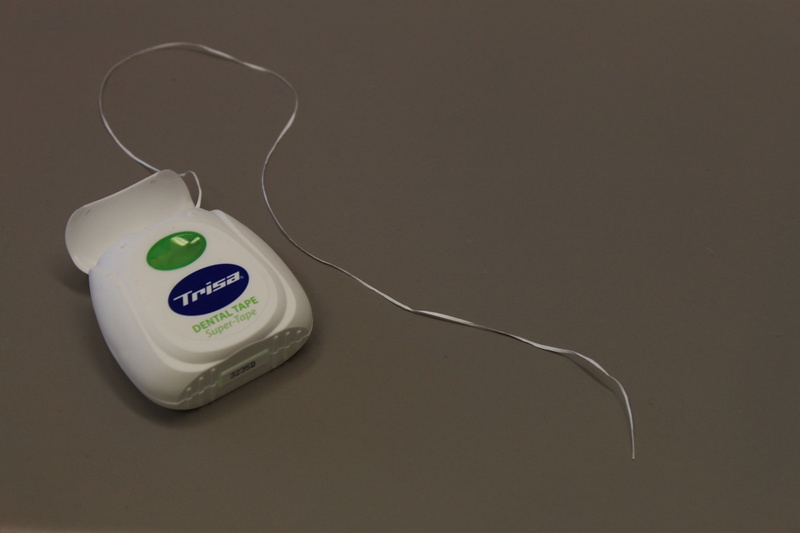 care, white color, oral, computer equipment, food and drink, indoors, capital letter, copy space, flossing, appliance, cable, number, temptation, clean
