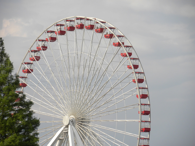 circle, cloud - sky, recreational, spinning, tall, round, spin, enjoy, large, kids, funfair, traditional, roundabout, low angle view, structure, enjoyment