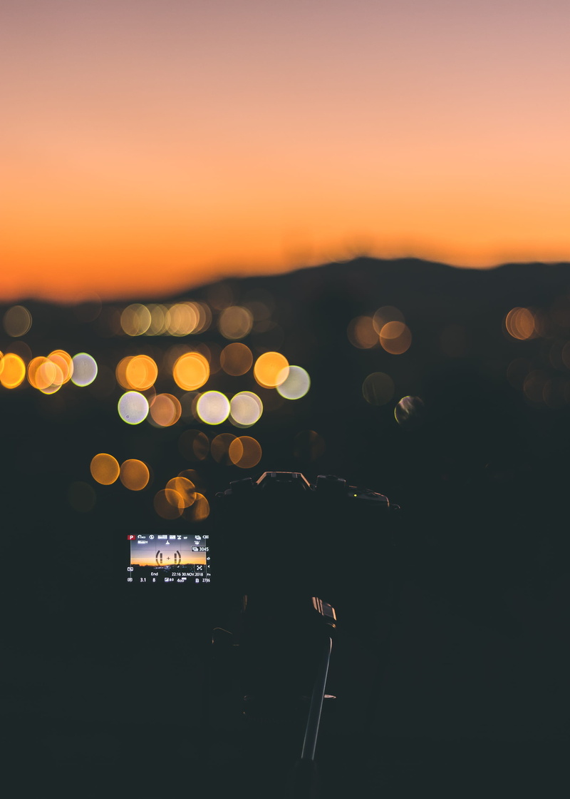 technology, landscape, camera - photographic equipment, silhouette, dramatic, lighting equipment, photography themes, moon, lens flare, bokeh, beauty in nature