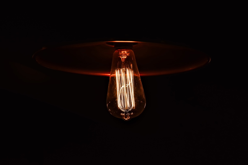 fuel and power generation, lamp, black Background, bulb, technology, single Object, power supply, shiny, illuminated, studio shot, dark, no people, glowing