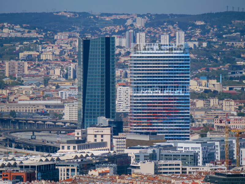 office building exterior, outdoors, office, nature, built structure, crowded, tower, architecture, high angle view, concrete, building, tourism, building exterior