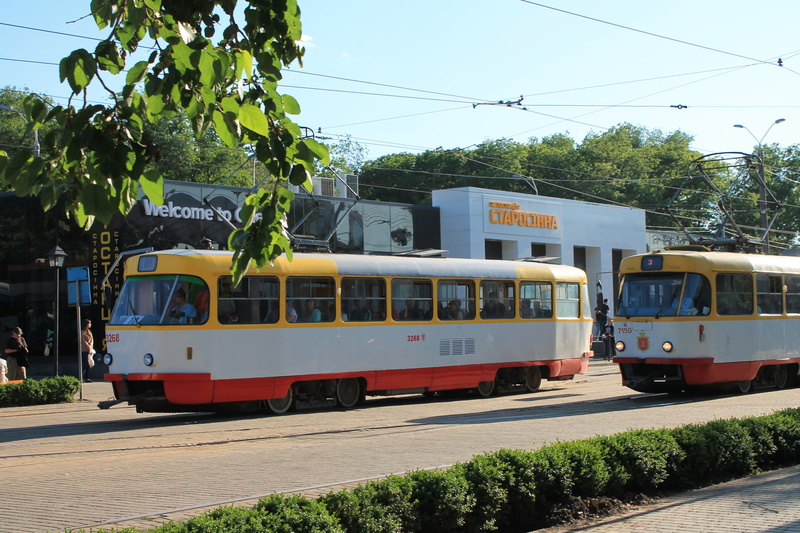 outdoors, rail transportation, odessa, transportation, land vehicle, train - vehicle, trams, city, travel, spring, ukraine, sunlight, tree, cable, nature