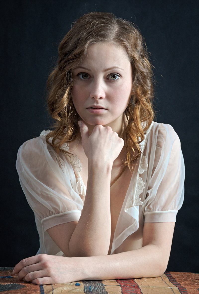 young women, beautiful woman, front view, looking at camera, resting, sitting, one person, blond hair, ms, character, white, hand, beauty, lifestyles, hairstyle