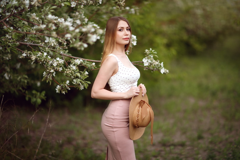 blossom, branch, women, hat, women outdoors, long hair, outdoors, 2K, Sergey Sorokin, skirt, model, flowers, depth of field, tank top, looking at viewer