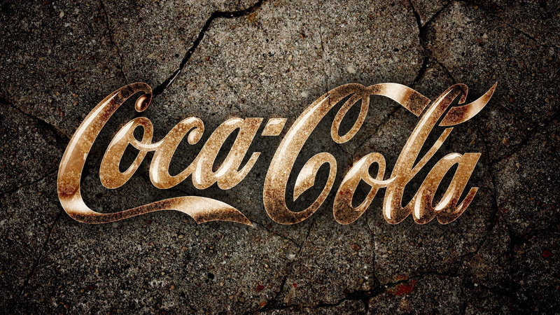 gold colored, solid, Drink, Logo, Coca-cola, single word, 2K, love, close-up, no people, Background, high angle view, text, asphalt, capital letter, emotion