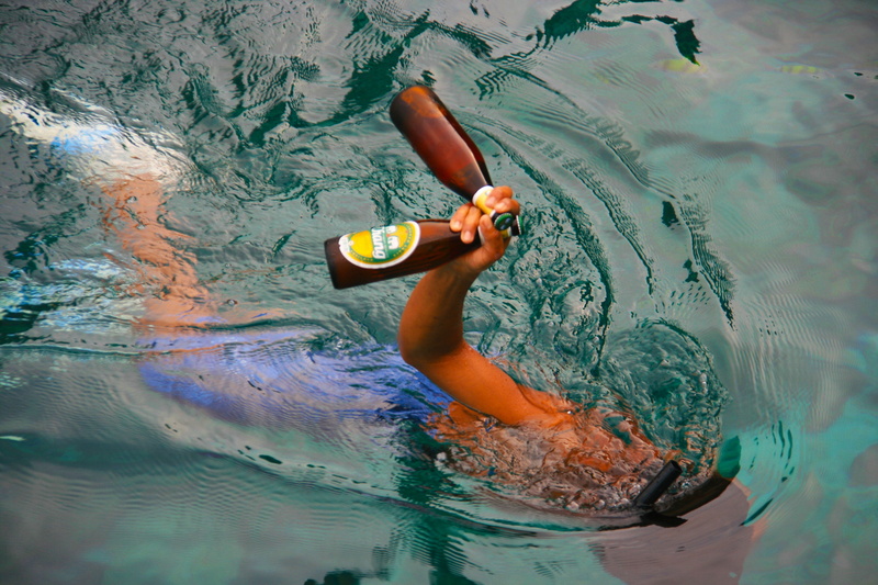 one person, floating on water, drink, beer, glass, swimming, leisure activity, human hand, snorkeling, diving, water, hand, floating, alcohol, beverage