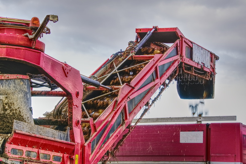 metal industry, beet diggers, building exterior, development, truck, outdoors, machine, sugar beet, red, construction industry, transportation, history