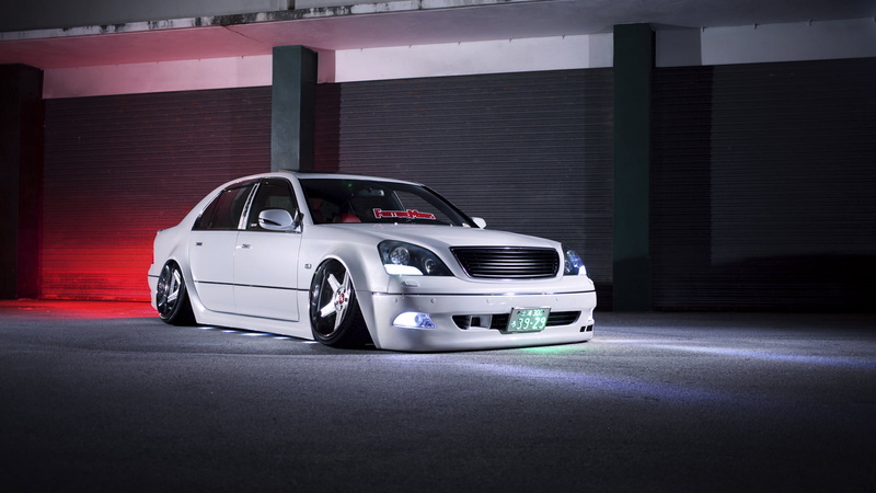 street, parking lot, racecar, parking garage, 1080P, built structure, outdoors, building exterior, road, on the move, mode of transportation, vip, ls430