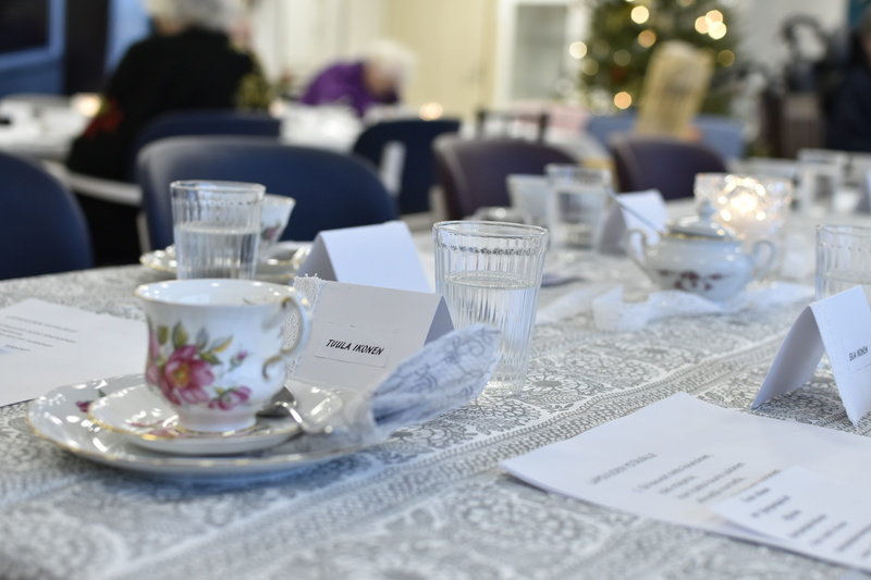 cup, food and drink, text, restaurant, party, table, eating utensil, coffee, selective focus, no people, water glass, tablecloth, setting, household equipment