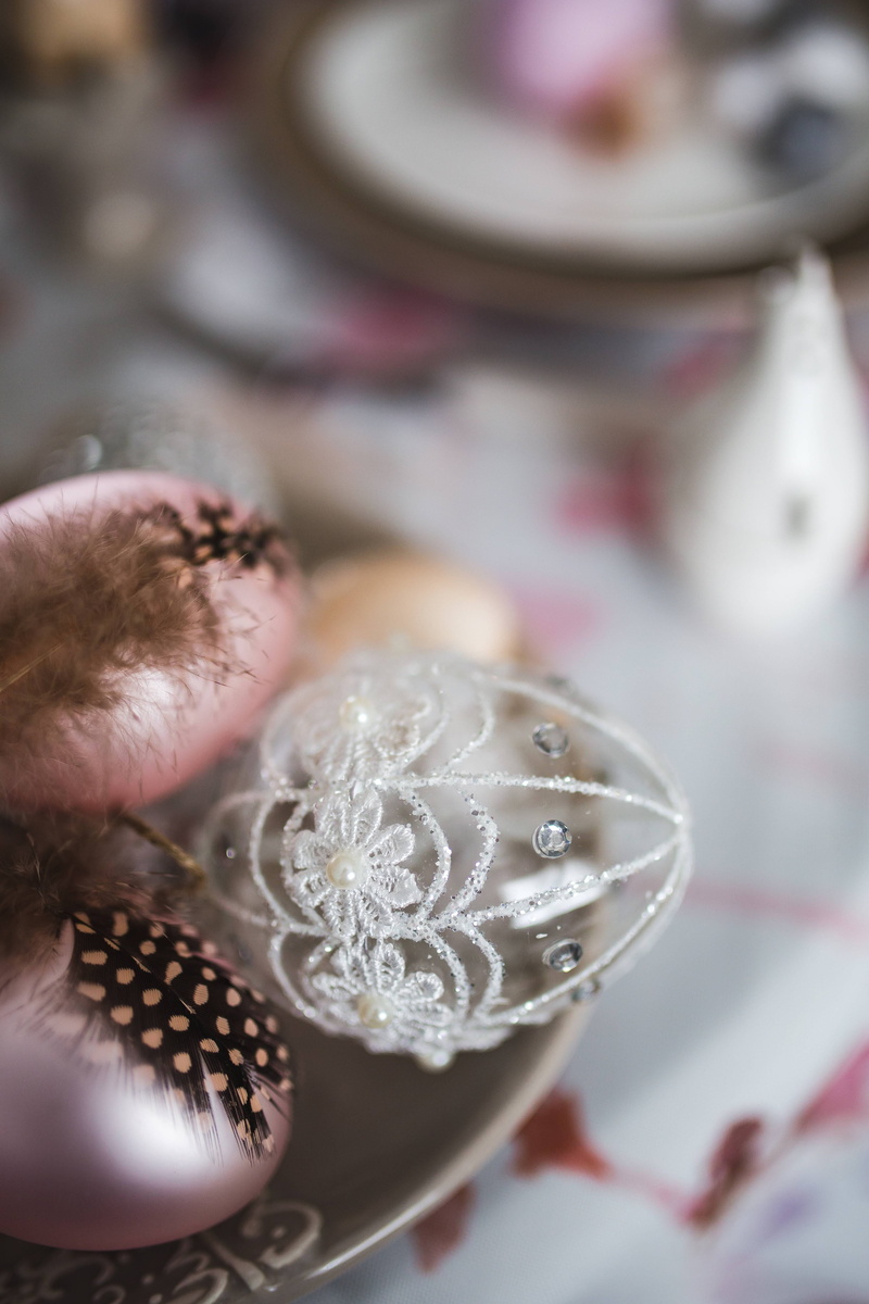 wealth, holidays, table, indoors, still life, pink, one person, design, ornaments, luxury, decoration, eggs, floral pattern, high angle view, jewelry, catkins
