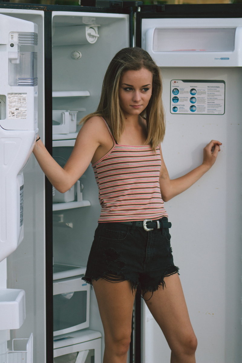 shorts, fridge, hair, model, teenager, young adult, three quarter length, one person, long hair, portrait, casual clothing, young women, hairstyle, lifestyles