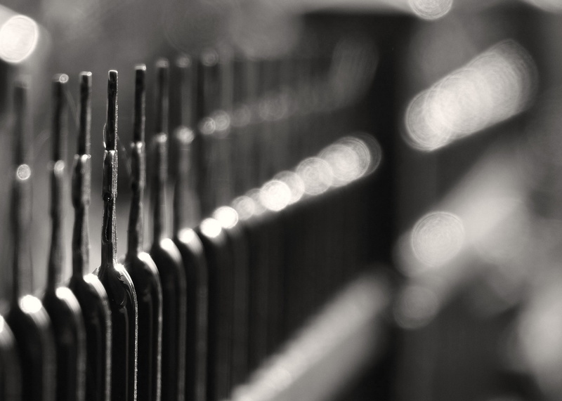 close-up, drink, focus on foreground, black, alcohol, fence, blurred, refreshment, choice, winemaking, pattern, in a row, food and drink, white, bottle