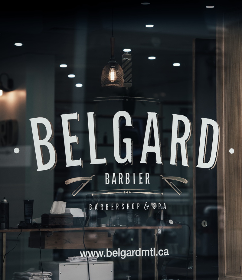 no people, illuminated, capital letter, information, reflection, indoors, belgard, barber, logo, light, communication, glass - material, number, transparent