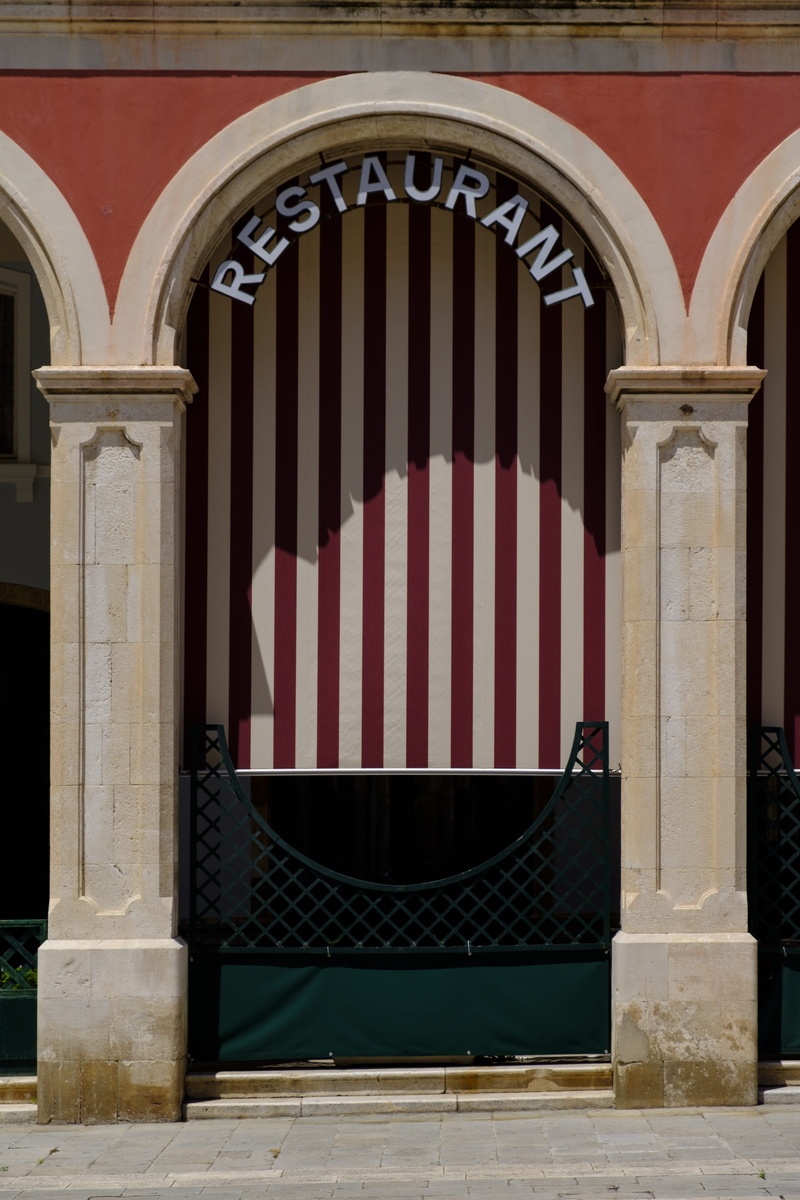 arch, no people, transportation, striped, coupon, red, door, history, metal, patriotism, day, window, archway, nature, built structure, pattern, colonnade