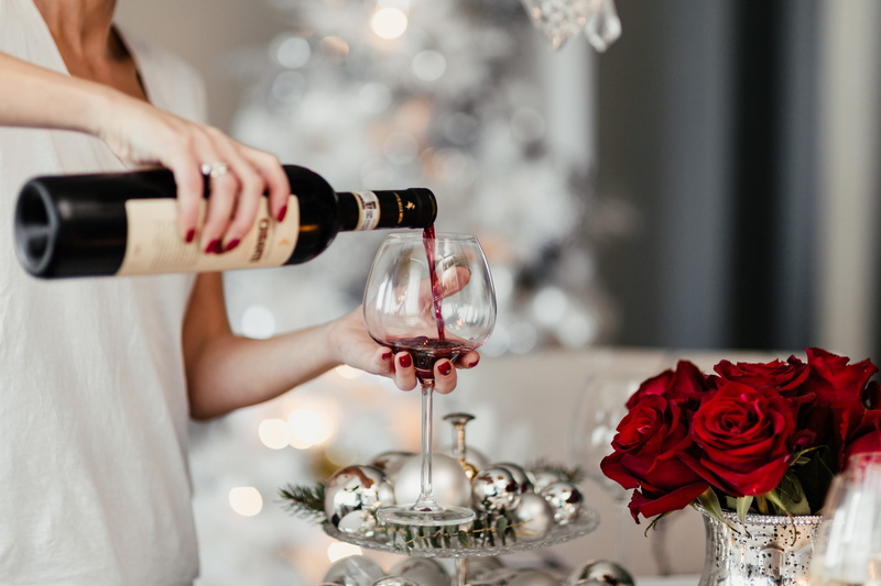 dining room, holding, rose, hand, human hand, red wine, xmas, food and drink, celebration, red, decorations, rose - flower, women, refreshment, wine, glass
