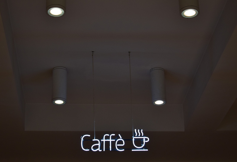 communication, architecture, low angle view, lamp, ceiling, door, no people, design, light fixture, public restroom, built structure, store, 5K, glowing