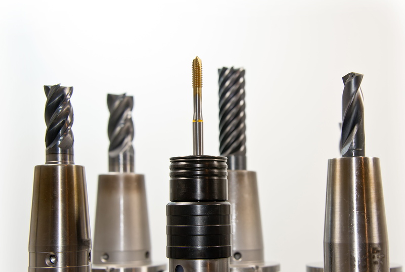 business, white background, no people, power tools, metal, group of objects, drilling heads, steel, industry, choice, variation, bit, set, success, close to