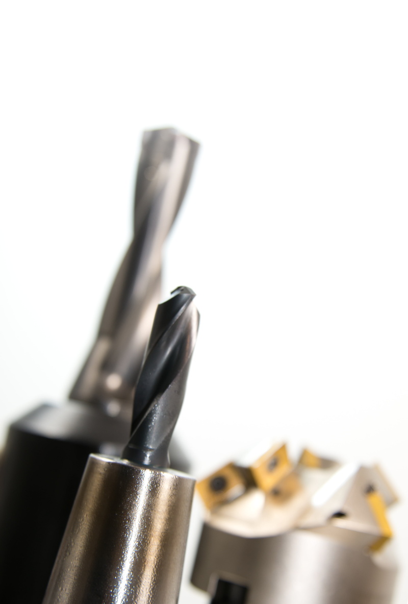 zerspahnen, studio shot, metalworking, copy space, work tool, technology, zerspahnung, focus on foreground, cnc machine, industry, white background, steel
