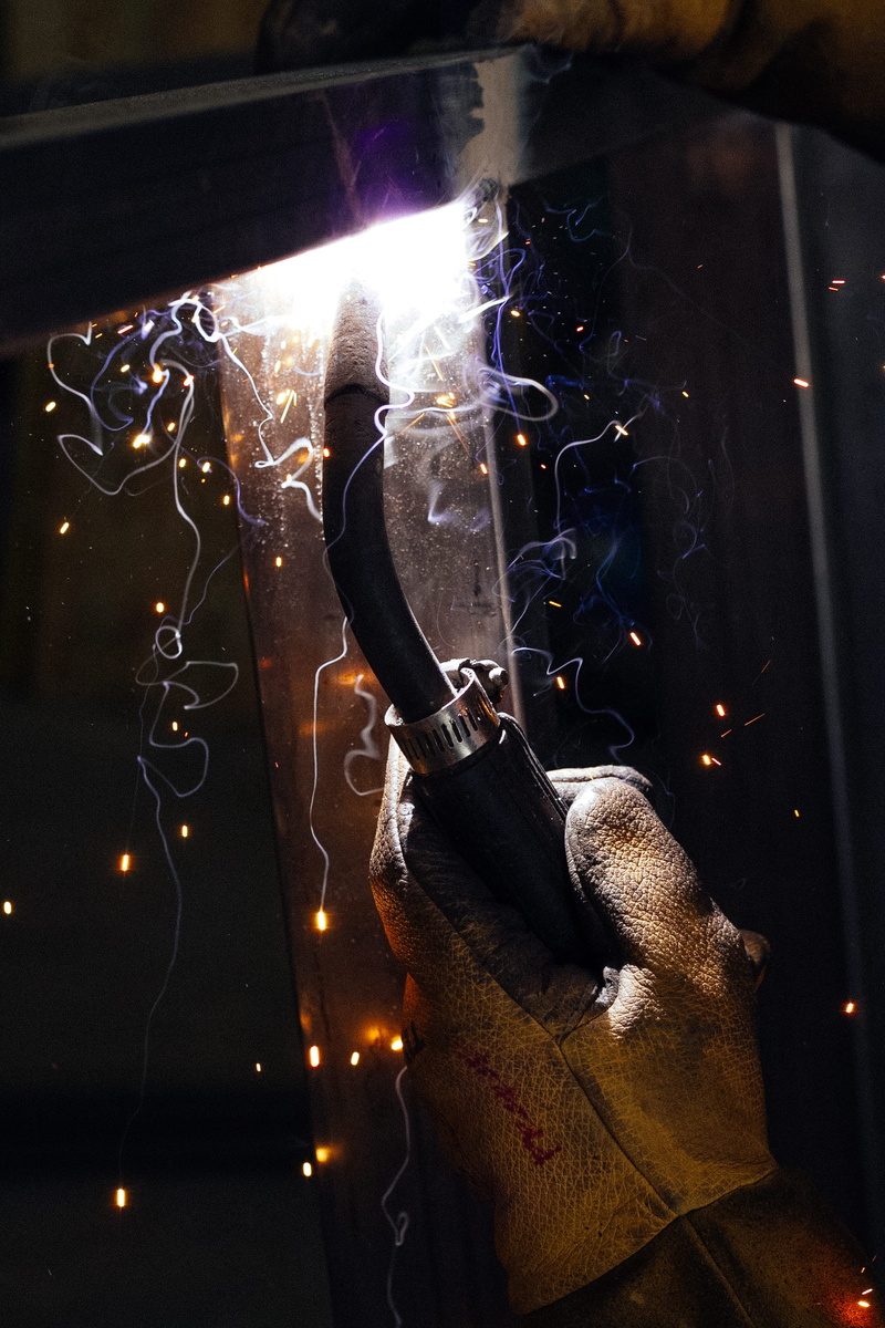 light, one person, indoors, men, working, mask, light - natural phenomenon, motion, night, glowing, 2K, human hand, construction, torch, blurred motion