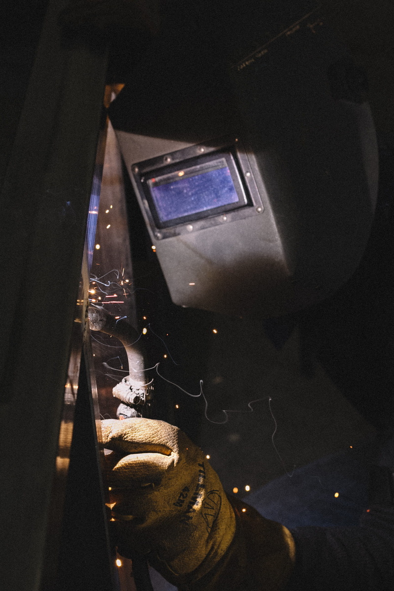 welding, welding torch, mask, high angle view, helmet, occupation, window, steel, glass - material, man, daytime, domestic room, metal, 2K, night, activity