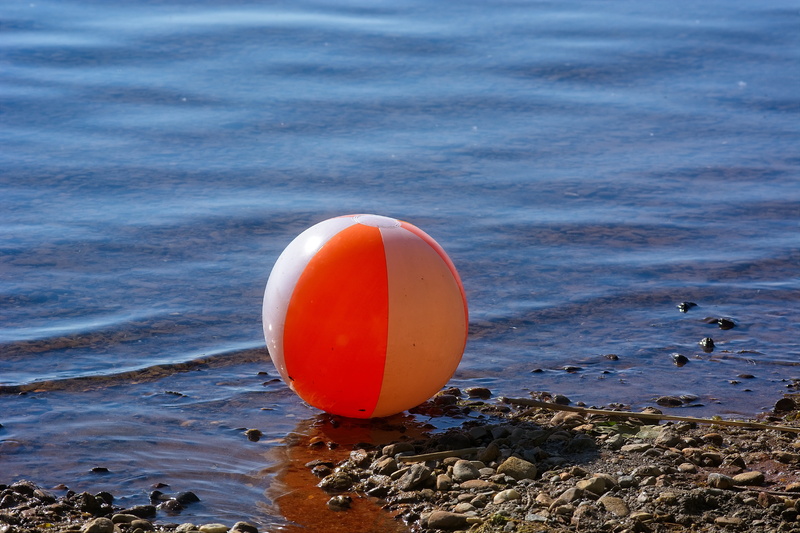 seashore, outdoors, Toys, beach toys, bath ball, orange, play, beauty in nature, red, focus on foreground, Water Polo, scenics - nature, land, safety, no people